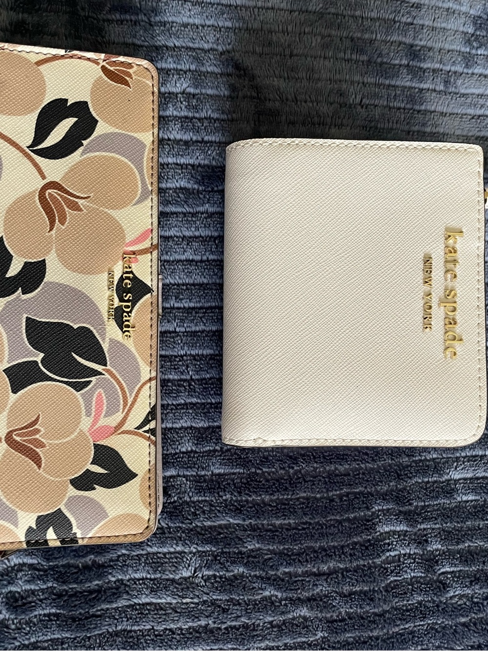 kate spade lot of 2 wallets 1 white and a cream floral